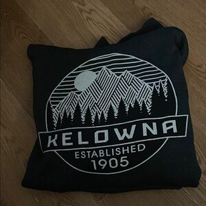 Dark gray, Kelowna Graphic Hoodie
Size large made in Canada like new condition